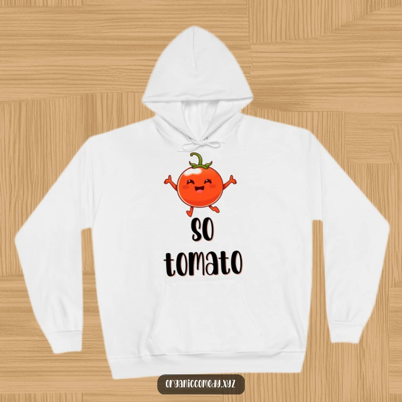 Funny, plump, cheerful tomato character happily leaping mid-air, featured on a cozy hoodie.